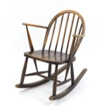 Ercol elm child's rocking chair, 75cm high