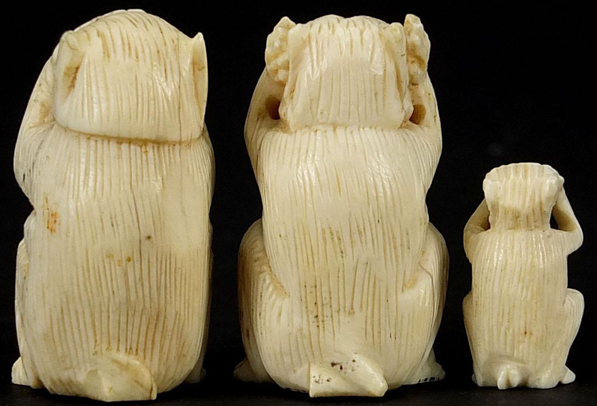 Three carved ivory wise monkeys, the largest 3.5cm high - Image 2 of 2