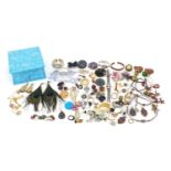 Vintage and later costume jewellery including Mexican silver bangle, brooches, earrings and