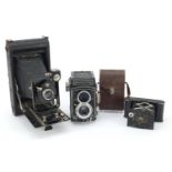 Three vintage cameras comprising Franke & Heidecke Rolleicord, Lukos II and Kodak A-127