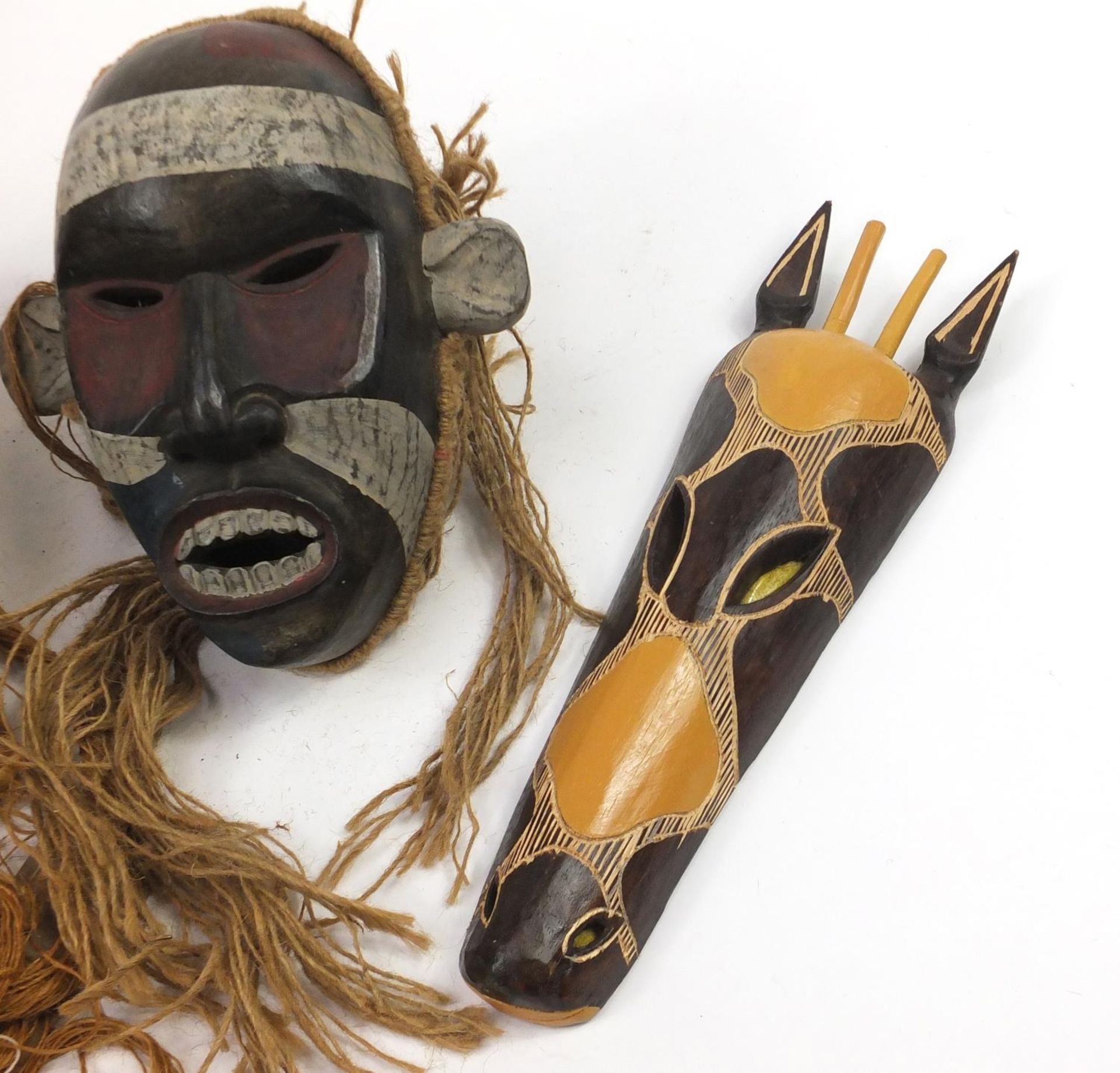Six hand painted African carved wood face masks, the largest 46cm high - Image 4 of 7