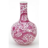 Chinese porcelain vase hand painted in pink with dragons amongst flowers and scrolling foliage, iron