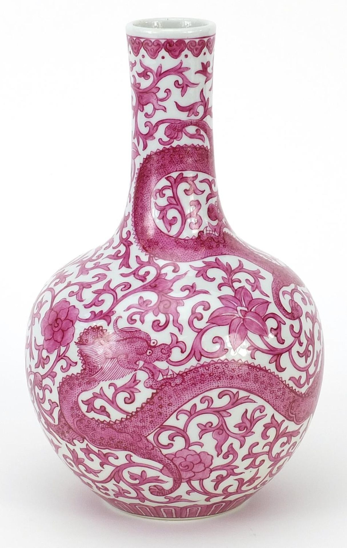 Chinese porcelain vase hand painted in pink with dragons amongst flowers and scrolling foliage, iron