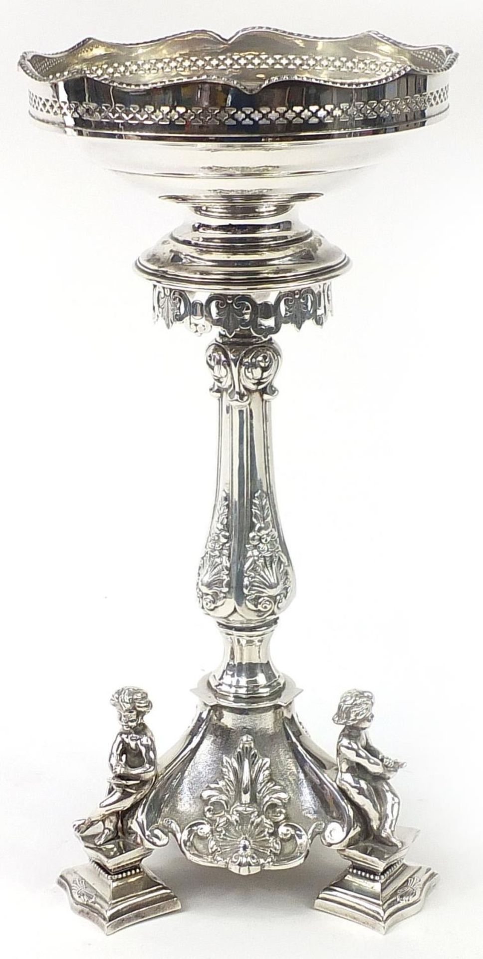 Silver plated centrepiece surmounted with three nude children, 40.5cm high