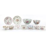 Chinese porcelain hand painted in the famille rose palette including tea bowls with saucers, the