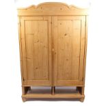 European stripped pine wardrobe, 200cm H X 132cm W x 61cm D