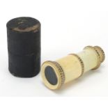 Georgian ivory monocular with enamelled unmarked gold mounts and case, 6.5cm in length when closed