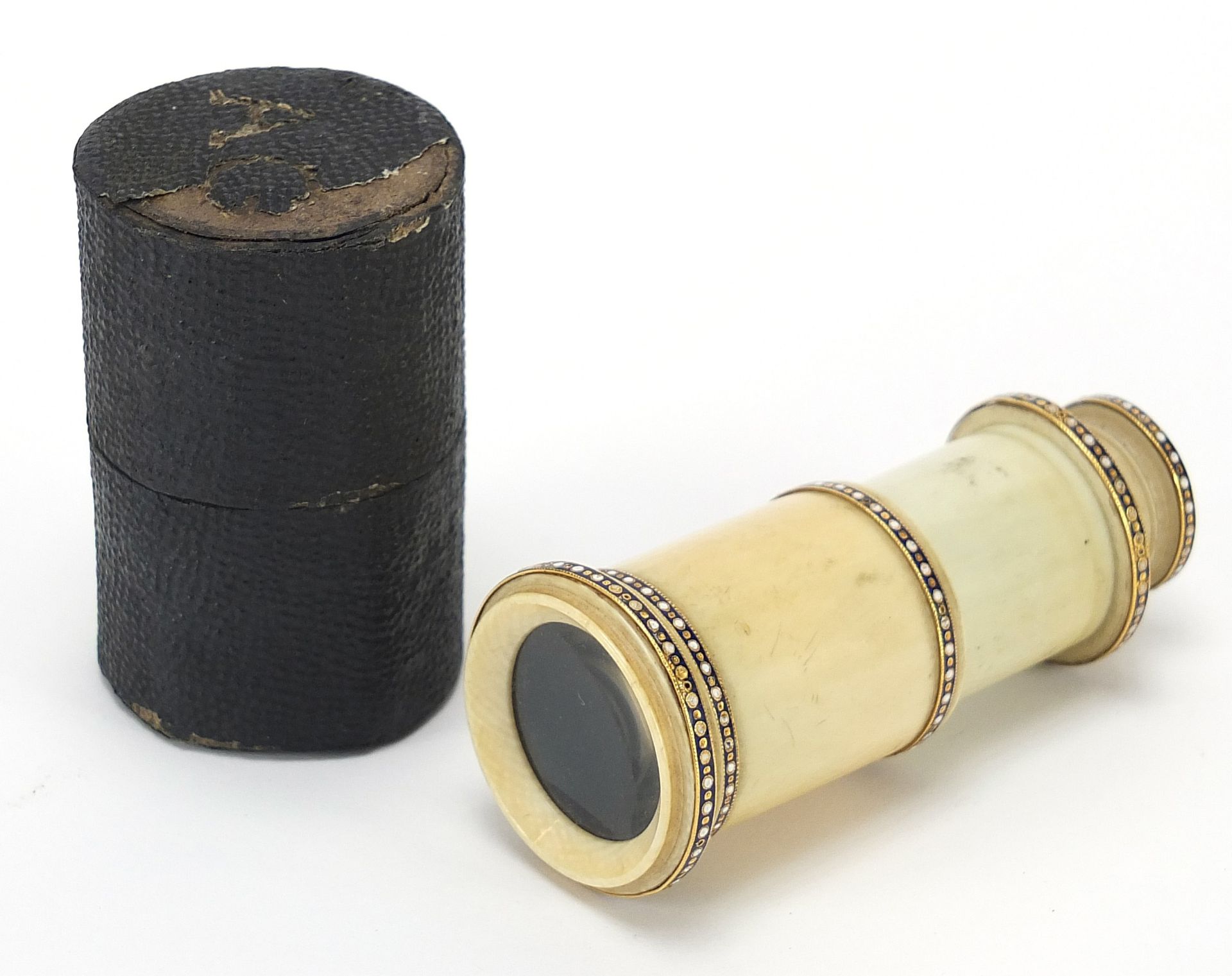 Georgian ivory monocular with enamelled unmarked gold mounts and case, 6.5cm in length when closed