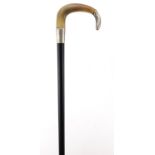 Ebonised walking stick with horn handle and silver mounts, 91.5cm in length