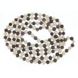 Freshwater black and white pearl necklace, 122cm in length, 85.2g