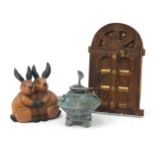 Sundry items including a carved wood window and Middle Eastern bronzed vessel, the largest 46cm high