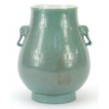 Chinese porcelain hu arrow vase with animalia handles having a spotted turquoise glaze, 19cm high