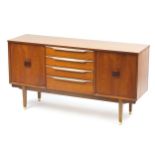 Mid century teak sideboard with a pair of cupboard doors and four central drawers, 74cm H x 140cm