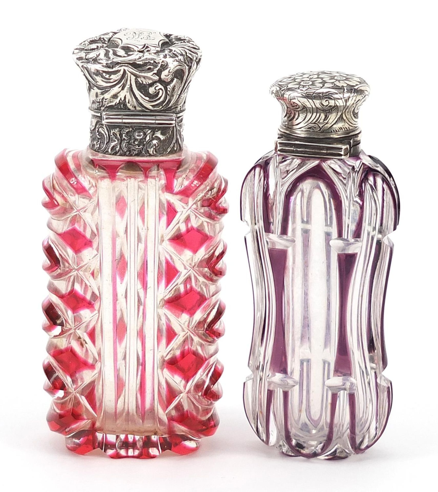 Two Victorian cranberry and amethyst flashed cut glass scent bottles with silver lids, the largest - Image 2 of 3