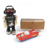 Vintage Strobot 3000 and a Russian Interkozmosz tin plate toy car with box, the robot 41cm high