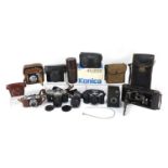 Vintage cameras and lenses including Zenit-B, Eumig, Halina 35X and Tamron 135mm lens