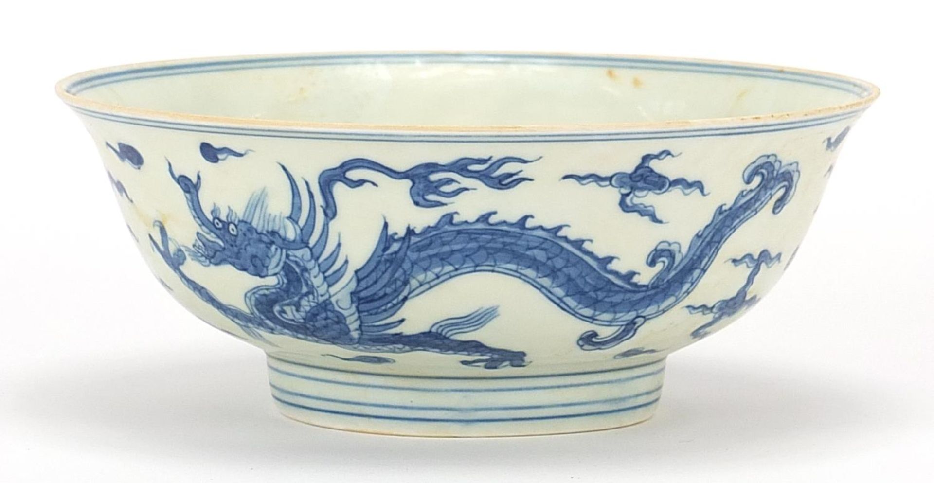 Chinese blue and white bowl with dragons, six figure character marks to the base, 18.5cm in diameter