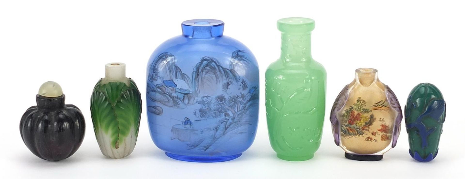 Six Chinese glass snuff bottles including two Peking cameo examples and two internally decorated