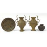 Indian and Middle Eastern metalware including a pair of vases with serpent handles decorated with