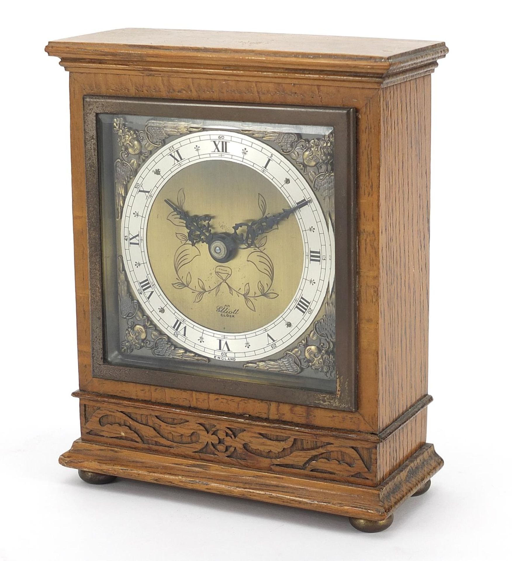 Carved walnut Elliott mantle clock with brass dial, 16.5cm high