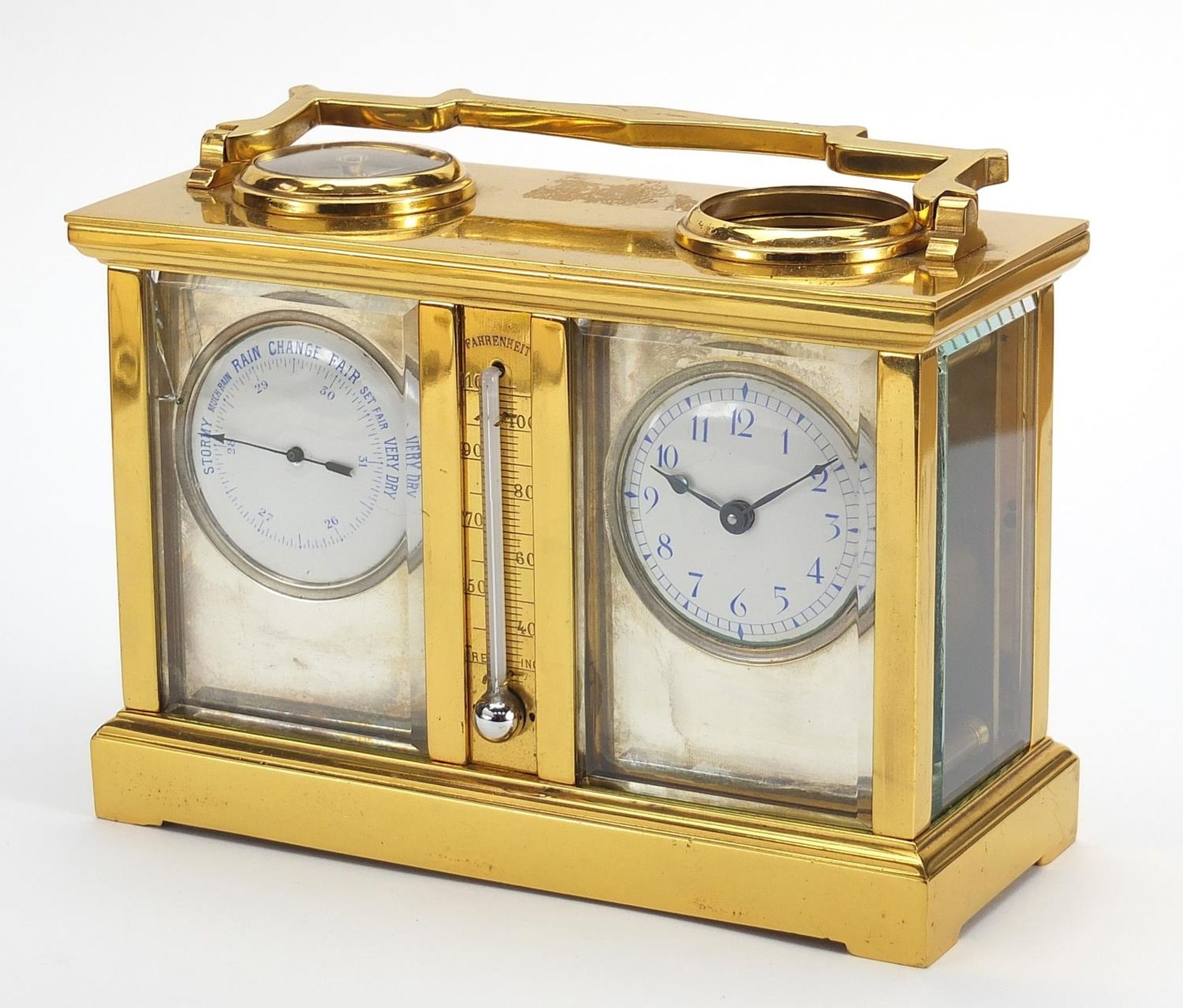 Brass cased travelling timepiece with barometer, clock, thermometer and compass, the barometer and