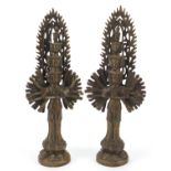 Pair of Tibetan patinated bronze figures of deities, each 35.5cm high