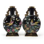 Attributed to Moser, pair of Bohemian glass moon flasks enamelled with birds amongst flowers, each