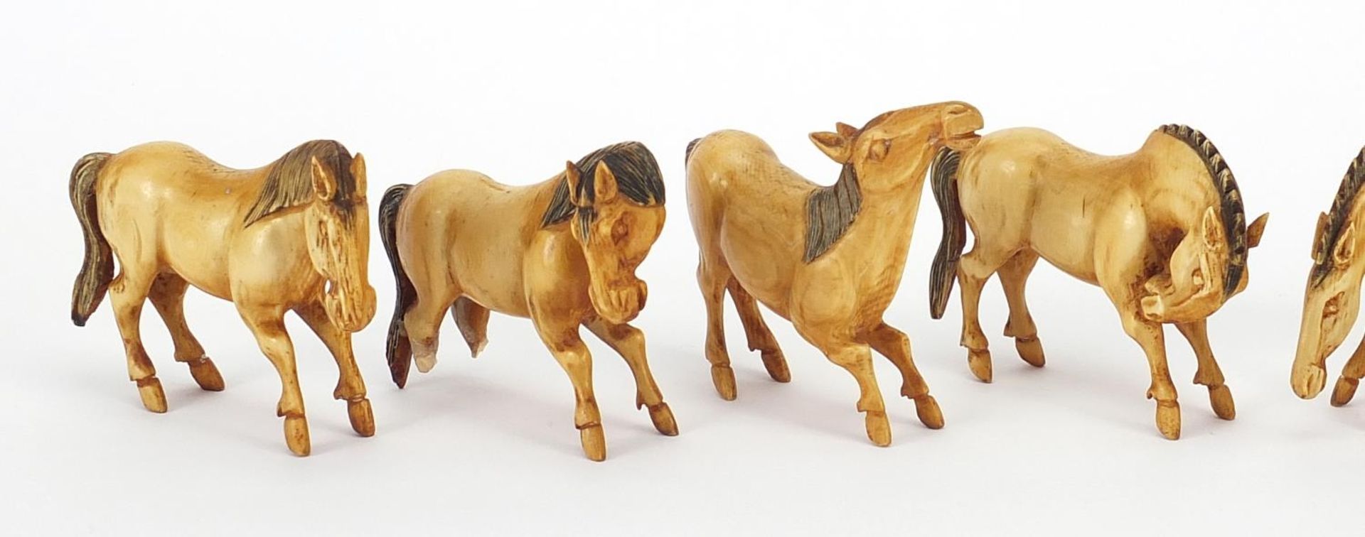 Set of eight Chinese carved ivory horses of Wang Mu, each approximately 6.5cm wide - Image 2 of 3