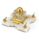 Betjemann's Patent, Victorian Partners onyx desk stand with gilt metal mounts and glass inkwell,
