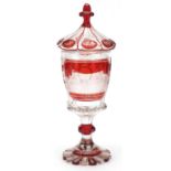 Good 19th century Bohemian ruby flashed glass goblet and cover etched with a view of the Crystal
