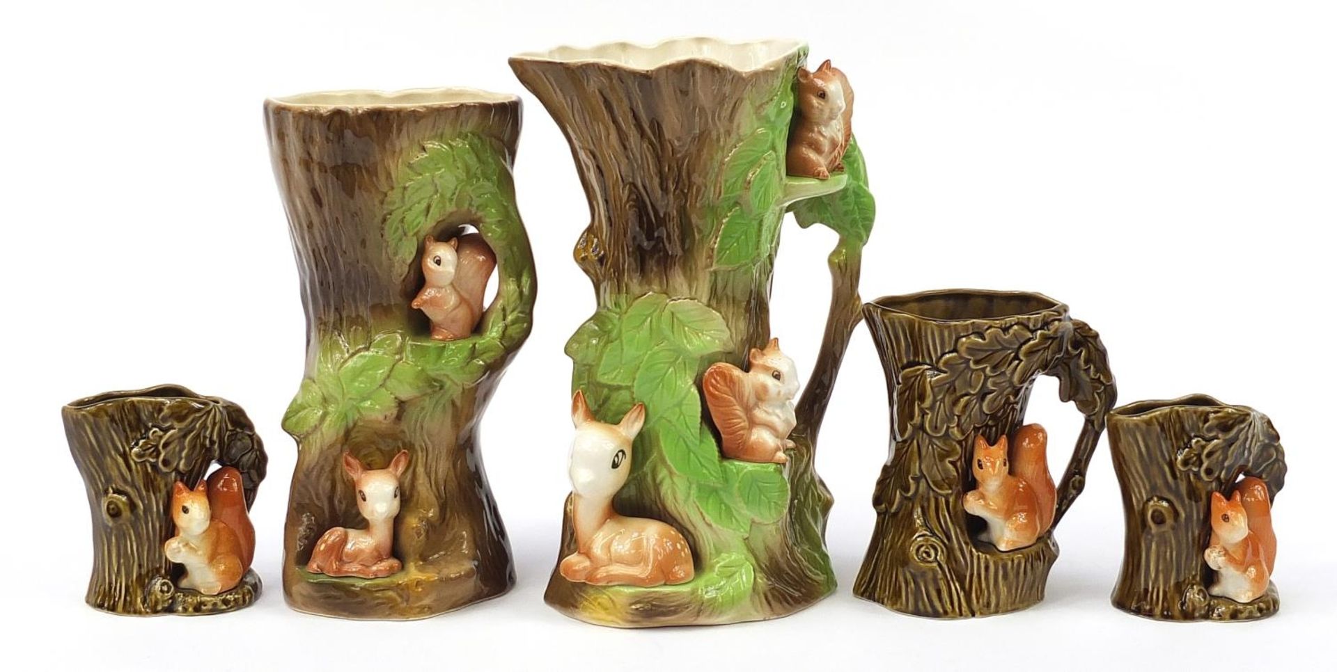 Two large Eastgate Fauna vases and three Sylvac vases, the largest 28cm high
