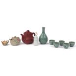 Asian ceramics including a Chinese Yixing teapot and a Japanese teapot enamelled with a bird amongst