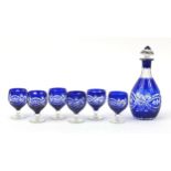 Bohemian blue flashed cut glass decanter with stopper and six glasses, the decanter 27cm high