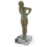 Verdigris patinated spelter figurine of a nude Art Deco female raised on a square marble base, 22.