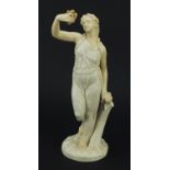 Royal Worcester, Victorian blush ivory figurine of a female holding a dove, 36.5cm high