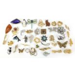 Vintage and later costume jewellery brooches including some jewelled and enamel