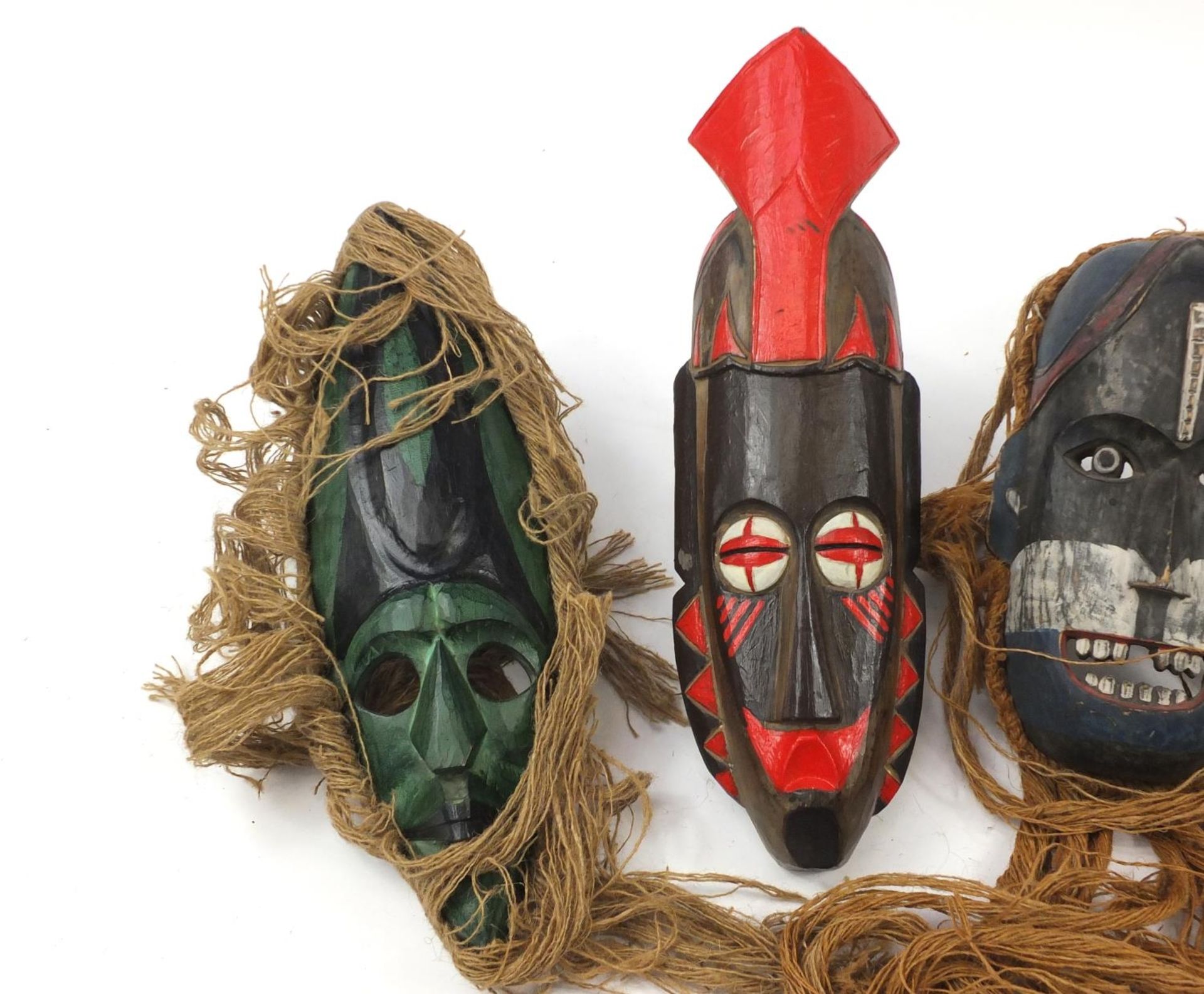 Six hand painted African carved wood face masks, the largest 46cm high - Image 2 of 7