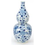 Chinese blue and white porcelain double gourd vase hand painted with dragons amongst flowers and