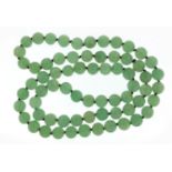 Chinese green jade bead necklace, 80cm in length, 154.8g