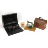 Vintage Lilliput typewriter and a Grain sewing machine, the typewriter 33cm wide