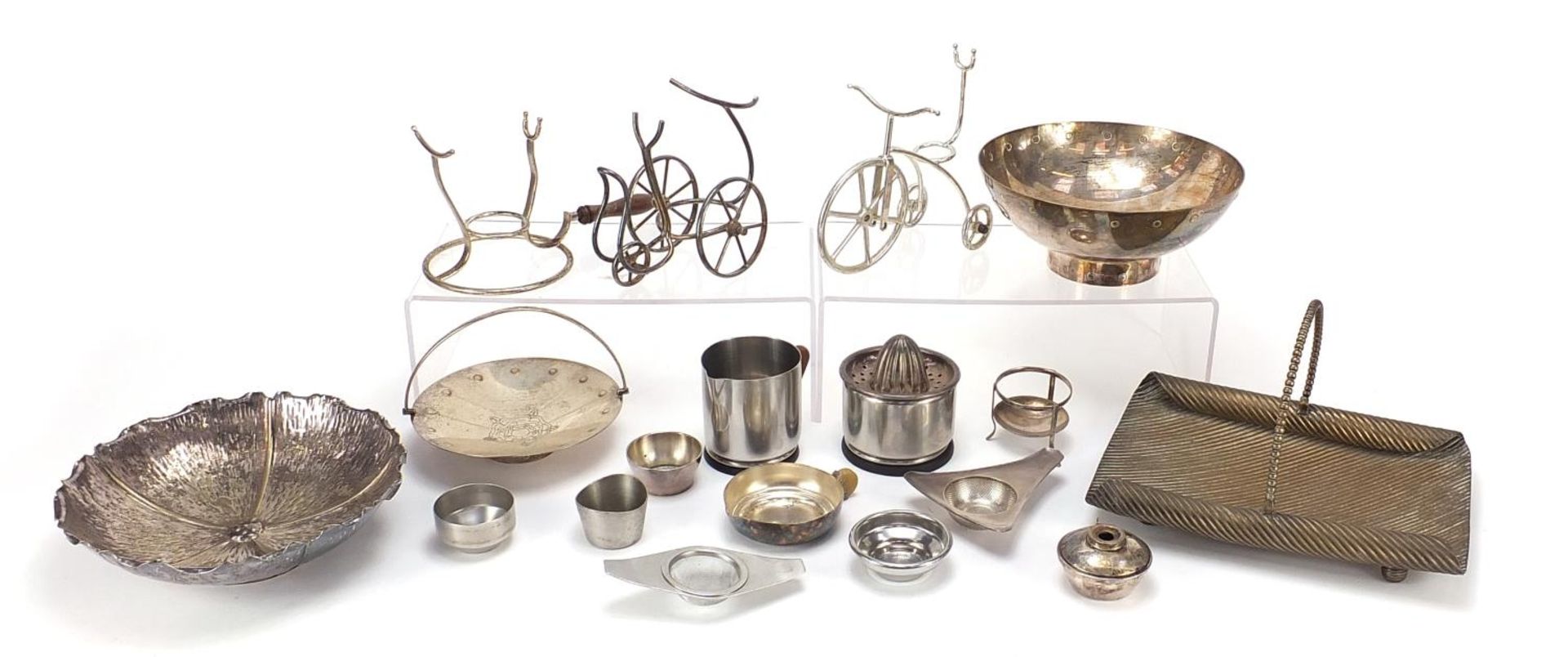 Decorative arts metalware including a Christopher Dresser basket with swing handle and Danish