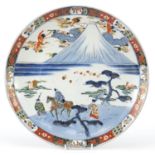 Japanese porcelain charger hand painted with figures before Mount Fuji, character marks to the base,