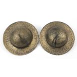 Pair of Tibetan bronzed cymbals with traces of paint, each 33cm in diameter