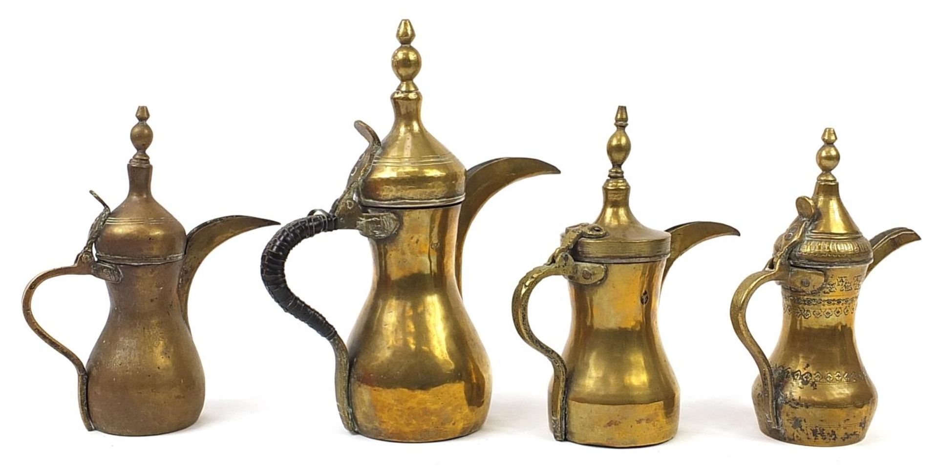 Four Imani brass dallah coffee pots, some with impressed marks, the largest 39cm high - Bild 2 aus 3