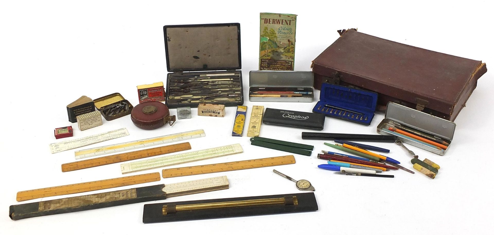 Vintage drawing instruments and apparatus including cased sets and wooden rules