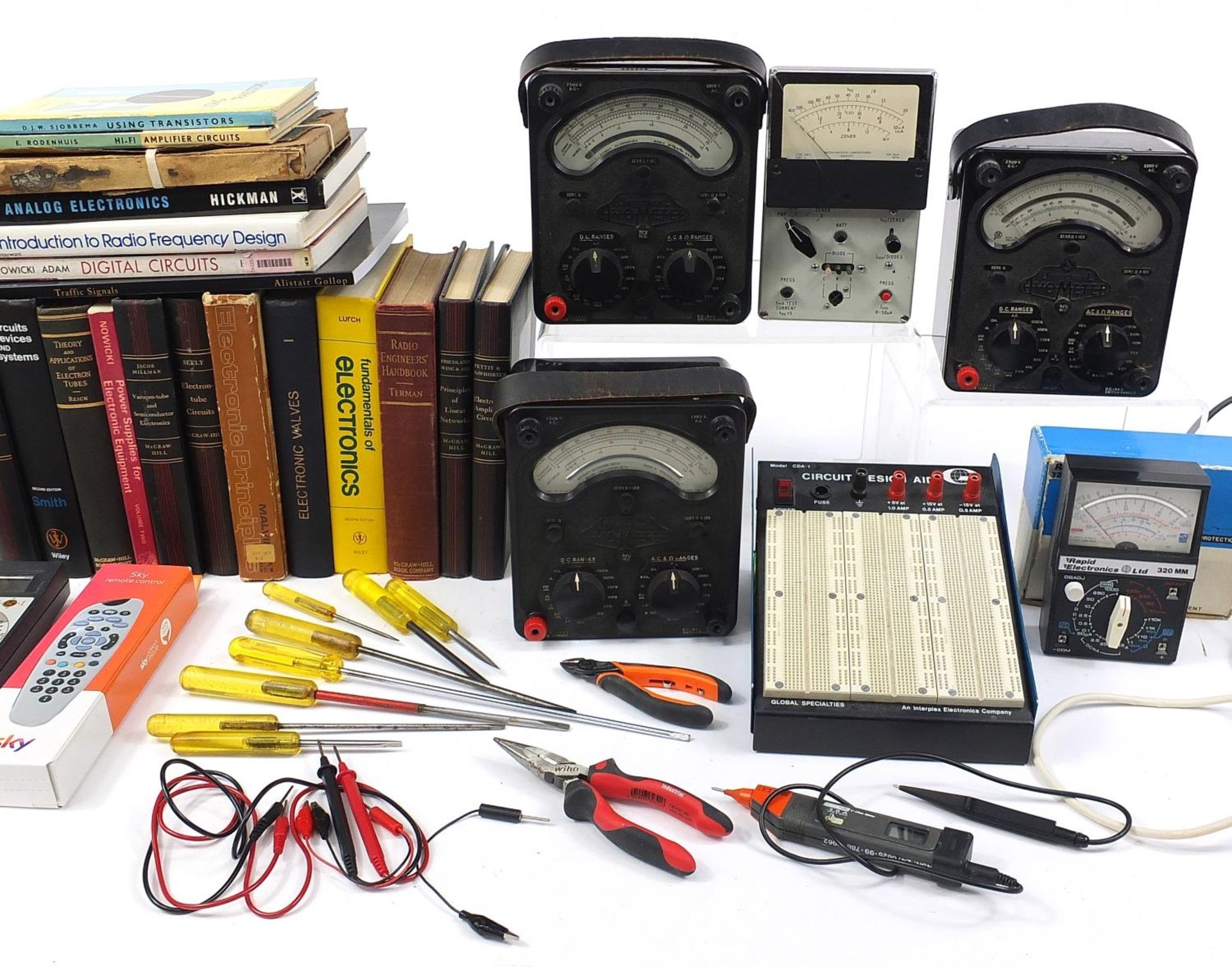 Collection of electrical voltage and circuit testing equipment and related books including Universal - Image 3 of 4