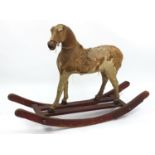 Antique leather straw filled child's rocking horse, 93cm high