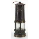 Vintage Thomas & Williams miner's lamp with plaque, indistinctly numbered, 25cm high