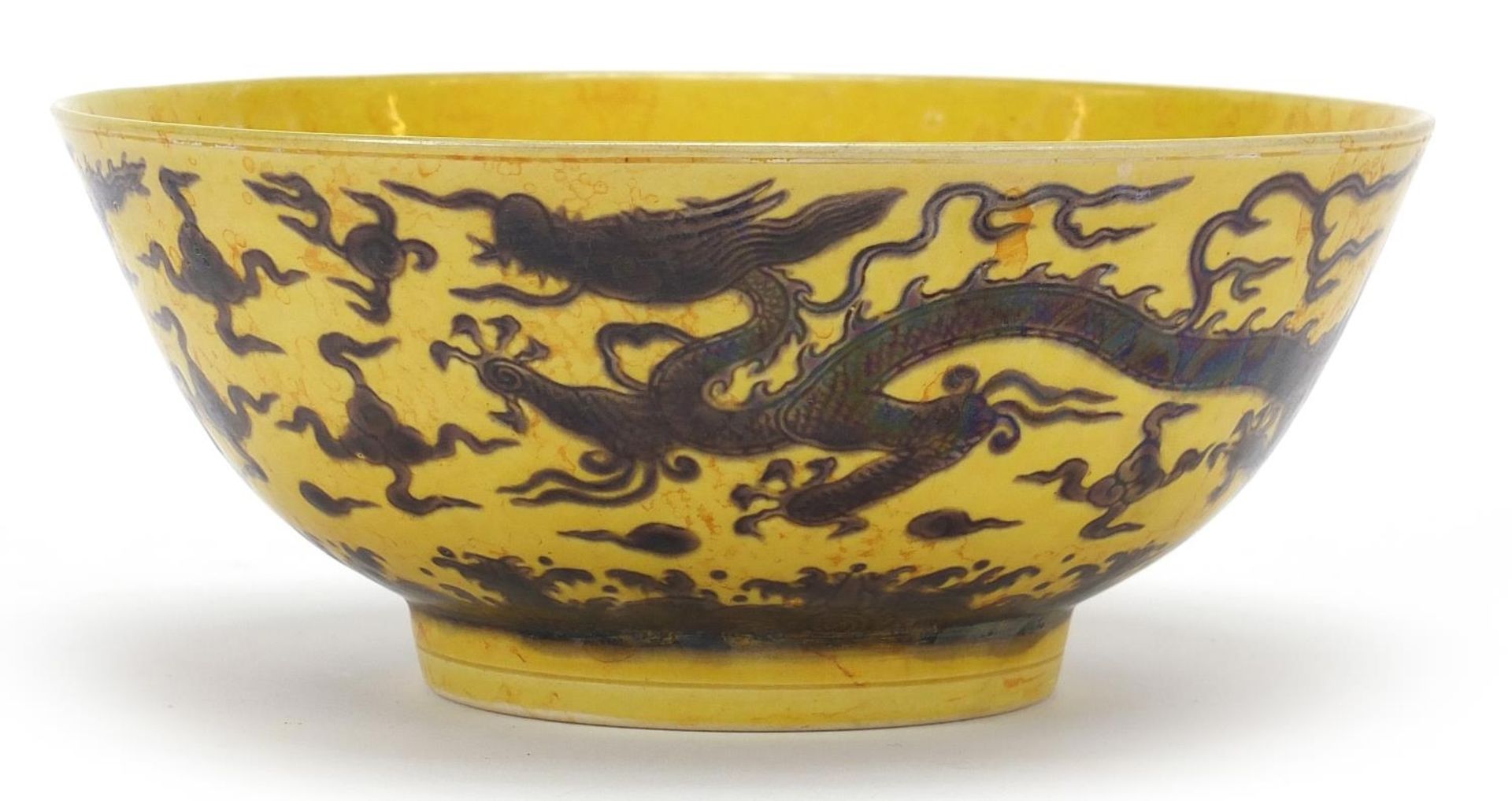Chinese yellow porcelain bowl hand painted with dragons on the exterior, blue six figure character