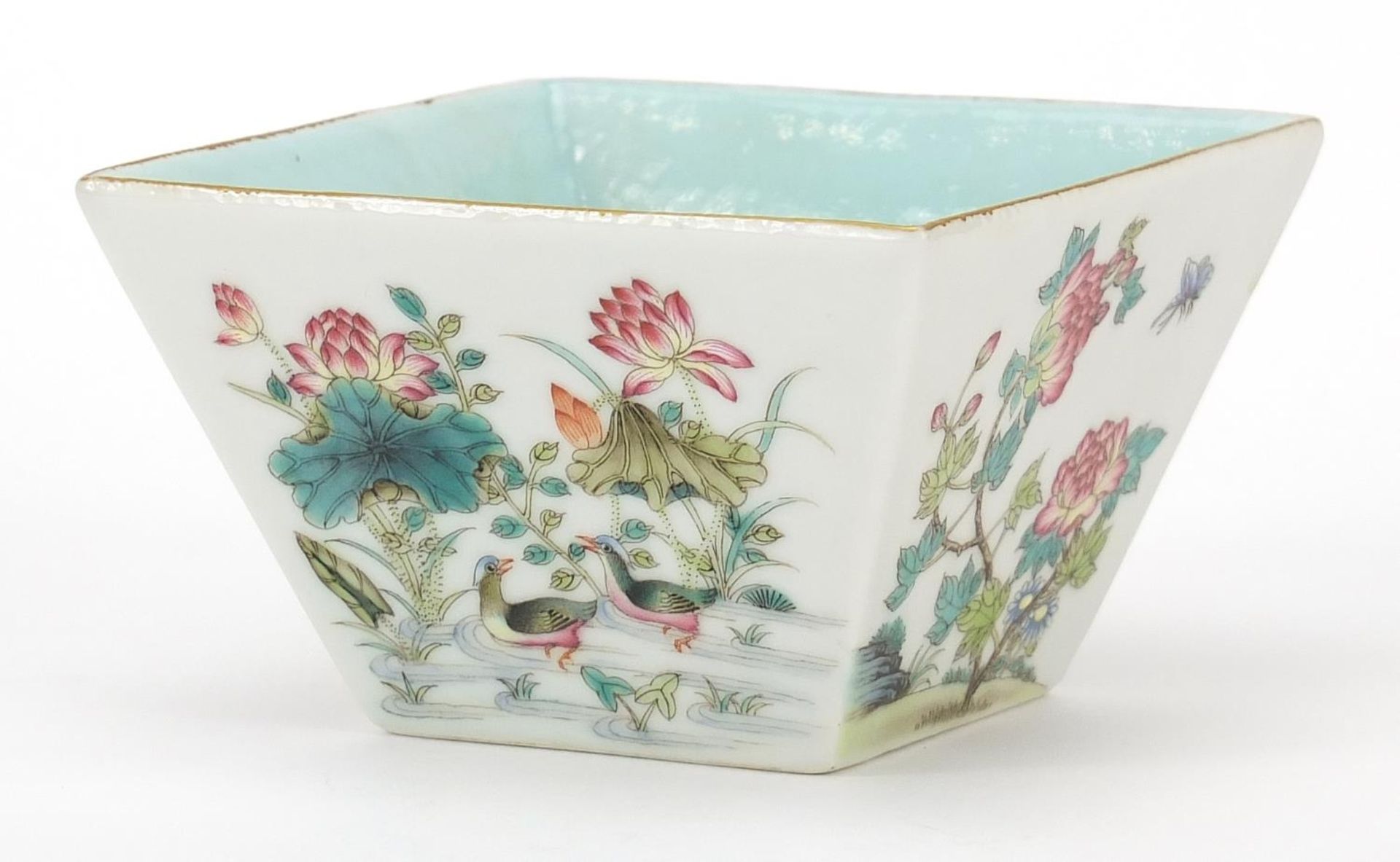 Chinese porcelain bowl hand painted in the famille rose palette with birds and insects amongst